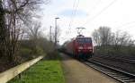 145 055-0 DB kommt durch Kohlscheid aus Richtung Aachen-West mit einem langen Kesselzug aus Antwerpen-Kanaaldok(B) nach Millingen und fährt in Richtung Herzogenrath,Neuss.