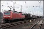 DB 145 018-8 und als Wagenlok DB Cargo 140 327-8 mit einem gemischtem Güterzug (Wustermark-Priort 16.03.2010)