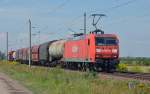 145 040 fuhr mit einem kurzen Güterzug am 04.08.12 durch Kyhna Richtung Delitzsch.