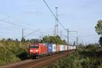 145 078 mit einem Containerzug in Ahlten am 30.09.2012.
