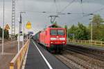 145 032-9  Probefahrt  am 25.04.2014 bei der Durchfahrt mit einem Containerzug in Richtung Schweiz in Müllheim (Baden).