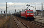 145 027 schleppte am 06.12.16 einen gemischten Güterzug durch Bitterfeld Richtung Leipzig.