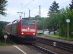 146 115-1 fhrt mit ihrer RB von Offenburg nach Mllheim gerade in Riegel ein.