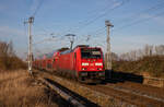 DB 146 281 mit dem RE1 Rostock - Hamburg am 07.02.2023 in Sildemow.