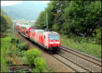 Mit stark verblichenem Farbkleid war am 4.10.2026 um 12.15 Uhr die DB 146011 auf der S 1 in K�nigstein mit ihrem Dosto nach Bad Schandau unterwegs.