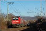 146 202-7 rauscht am 23.01.08 mit RE 19456 nach Stuttgart Hbf an den Industriegebuden der Stadt Aalen vorbei, in ca.