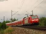 The DB Regio BR 146 112-8 passes in Haltingen with a regional train from Offemburg to Basel Badischer Bahnhof.