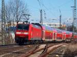 146 025-2 zieht am 03.03.2010 den RE1 von Hamm in Westfalen vor Rothe Erde nach Aachen.