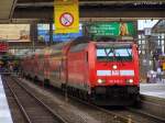 146 246-4 am RE in Richtung Nrnberg in ihrer Abfahrtstation Mnchen Hbf am 29.03.2010