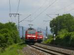 146 113 mit ihrem RE Offenburg-Basel Bad trifft 111 050 mit der RB Neuenburg- Freiburg Hbf. 29.5.10