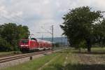 146 238-1 mit RE von Karlsruhe Hbf nach Offenburg am 6. August 2010 bei Muggensturm.