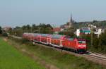 146 237-3 mit RB 26895 (Offenburg - Freiburg(Breisgau) Hbf) [Sonderleistung] am 25. September 2011 bei Teningen. Diese RB fuhr anlsslich des Papstbesuchs in Freiburg und wurde durch 2 Wagen des RMV verstrkt.