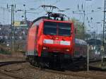 146 014 zieht am 27.03.2012 RE1 aus Aachen Hbf (rechts im Hintergrund) nach Paderborn.