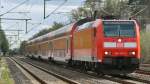 146 119-3 durchfhrt am 15.04.2011 den Bahnhof von Dreieich-Buchschlag.