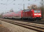Am 29.03.2013 schob 146 113-6, noch ohne Werbung, einen RE gen Norden in Orschweier.