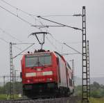 Vor dem Regen geduckt und einen Schuss auf 146 244-9 gewagt, die einen RE nach Wrzburg Hbf schiebt.