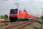 146 238-1 schob am Morgen des 11.07.2013 die RB 26550 (Basel Bad Bf - Offenburg) aus dem Bahnhof Orschweier in Richtung dem nchsten Halt in Lahr (Schwarzw).