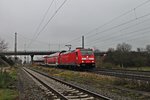 146 201 am 29.11.2014 bei der Einfahrt mit einem RE (Offenburg - Basel Bad Bf) in Müllheim (Baden).