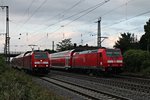 Während die Freibruger 146 232-4 am 09.06.2015 mit einem RE (Offenburg - Müllheim (Badden)) auf die EInfahrt auf dem Überholgleis wartet, schob die 146 230-8  Radolfszell  einen RE