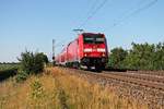 Mit einem RE (Offenburg - Basel Bad Bf) fuhr am 10.07.2015 die Freiburger 146 232-4 bei Hügelheim in Kürze in ihren nächsten Zwischenhalt in Müllheim (Baden) ein.