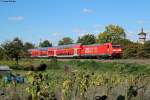 146 221 mit dem RE 19509 (Heidelberg-Stuttgart) bei Bruchsal-Schlachthof, 28.09.2015.