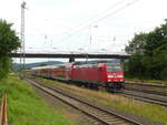 DB 146 251 mit dem RE 4597 von Bebra nach Frankfurt (M) Hbf, am 30.06.2021 in Mecklar.