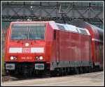 146 203 macht am 14.7.12 mit einem RE Ulm - Mosbach im Bahnhof Geislingen (Steige) halt.