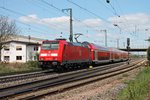 Einfahrt am 18.04.2015 von 146 228-2  St.Georgen  mit einem RE (Offenburg - Basel Bad Bf) in Müllheim (Baden).