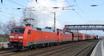 DB Cargo AG [D] mit der Doppeltraktion  152 052-7  [NVR-Nummer: 91 80 6152 052-7 D-DB] +   152 089-9  [NVR-Nummer: 91 80 6152 089-9 D-DB] mit dem Erzzug (leer) Richtung Hamburg am 02.03.20 Bf. Saarmund.