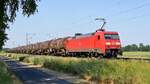 DB Cargo  152 008-9 mit Kesselwagenzug in Richtung Osnabrück (bei Lembruch, 12.06.2023).