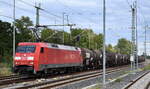 DB Cargo AG [D] mit ihrer  152 149-1  [NVR-Nummer: 91 80 6152 149-1 D-DB] und einem Kesselwagenzug (Ladegut Anilin) am 04.08.23 Höhe Bahnhof Leipzig Thekla.