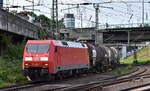 DB Cargo AG, Mainz mit ihrer  152 005-5  [NVR-Nummer: 91 80 6152 005-5 D-DB] verlässt mit einem Kesselwagenzug den Hamburger Hafen am 21.05.24 Höhe Bahnhof Hamburg-Harburg.