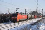 152 036 war mit einem Gterzug uaf der Fahrt von Seddin nach Seelze hieram 04.01.2010 um 12:07 in Ahlten