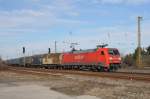 Mit einem Gterzug fhrt 152 046-9 durch Coswig in Richtung Dresden. Fotografiert am 12.02.2011. 