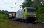 152 005-5 (Claas) ist mit einem vollem Schotterzug am 26.06.2012 bei Kaiserslautern Pfaffwerk