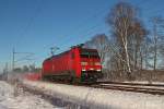 Die 152 042-8 mit einen Taschenwagenzug am 29.12.2014 in Nassenheide.