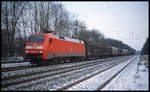 DB 152159-0 fährt hier am 1.2.2003 mit einem Güterzug Richtung Münster durch den Bahnhof Natrup- Hagen.