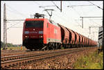 Railion 152046-9 ist hier bei Dedensen am 12.09.2006 mit einem Ganzzug in Richtung Wunsdorf unterwegs.