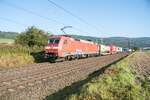 152 064-2 mit einen Aufliegerzug in Richtung Süden bei Reilos am 08.09.2021 unterwegs.
