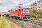 152 053-5 mit einem gemischten Güterzug am 22.03.2023 bei Kerzell.