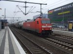 152 003-0 mit einem gemischten Güterzug durch Bielefeld.
