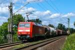 Am 28/07/2009 zog 152 006-3 einen gemischten Güterzug durch Ariendorf Richtung Süden.
