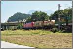 Eine 182 schiebt einen Kombizug, gefhrt von einem 1116-1144er Tandem von Kufstein zum Brenner. Aufgenommen bei Kufstein im Juni 2005