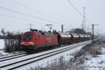 182 023-2 (Railion DB Logistics) fhrt am 30. Januar 2010 um 15:21 Uhr mit einem Gterzug durch Ahlten