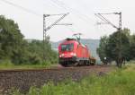 182 021-6 legt sich mit ihrem gemischtem Gterzug in Fahrtrichtung Sden vor Eschwege West in die Kurve. Aufgenommen am 06.07.2011.