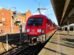 182 001 8 am Zugschluss des RE nach Cottbus in Rathenow am 30.11.2011