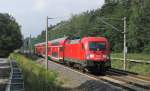 182 001-8 kommt hier am 07.07.2012 mit seinem RE2 nach Wismar ber Berlin durch Bestensee gefahren. In wenigen Minuten erreicht der Zug den nchsten Halt Knigs Wusterhausen.