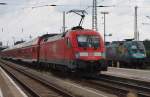 Hier 182 002 mit einem RE1 (RE18124) von Cottbus nach Magdeburg Hbf., bei der Ausfahrt am 11.7.2014 aus Cottbus.