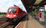 182 021-6 fährt am 30.08.2014 mit der S1 nach Bad Schandau in die S-Bahnstation Dresden-Reick ein.