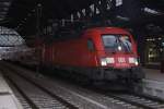 Die 182 023-2 als ziehende Kraft einer S-Bahn Traktion beim Halt in Dresden-Neustadt am 11.03.2015.